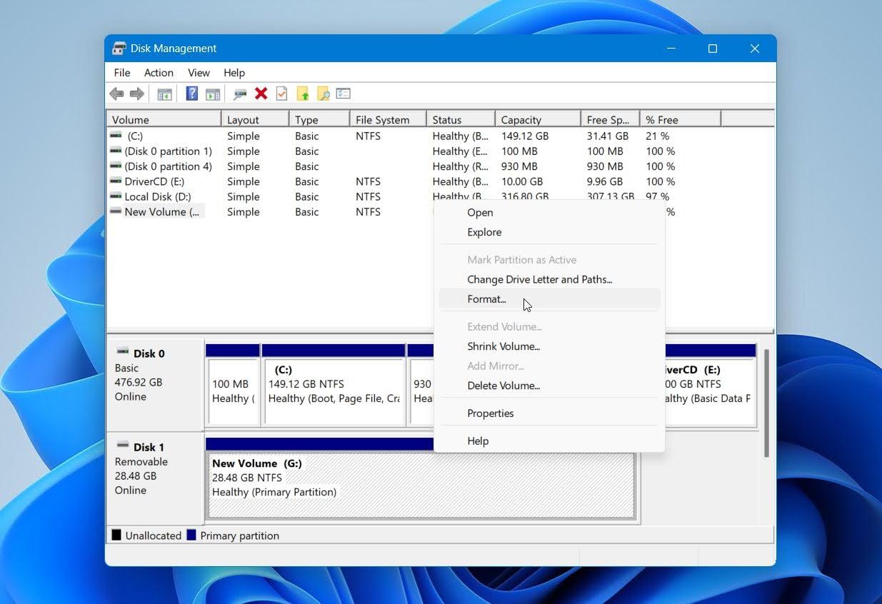 Open Disk Management and click Format