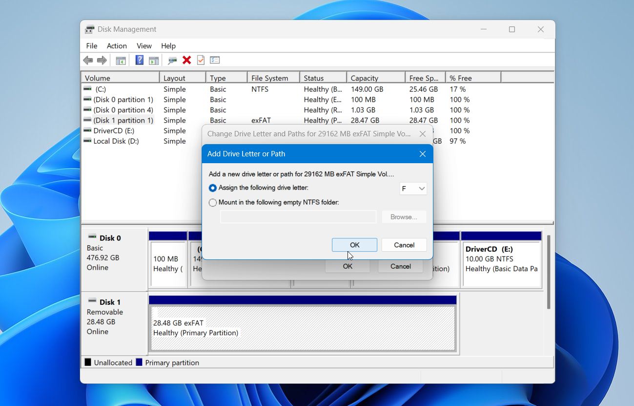 Disk Management select a new letter