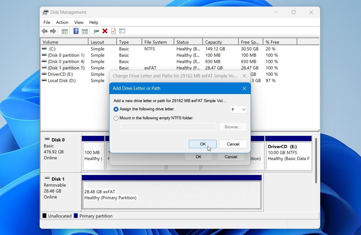 Disk Management select a new letter